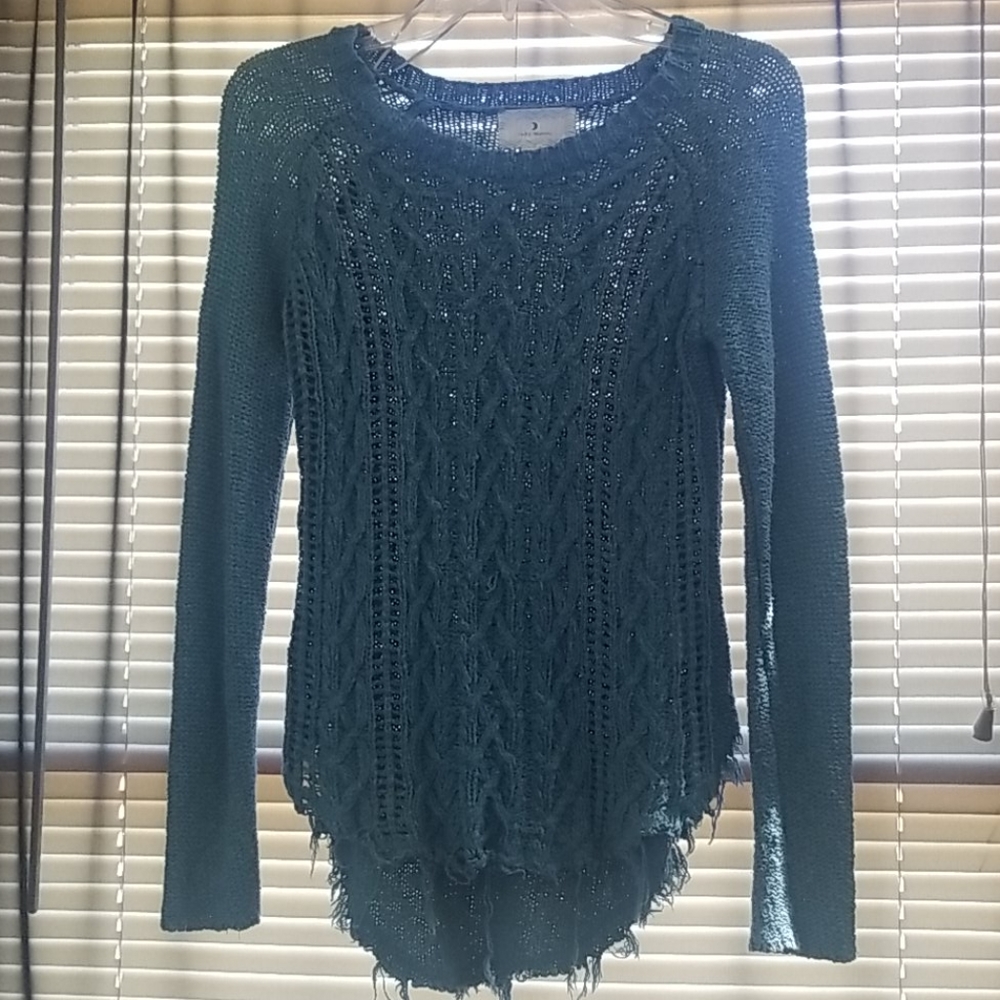 Fringed sweater by the brand: Ruby Moon